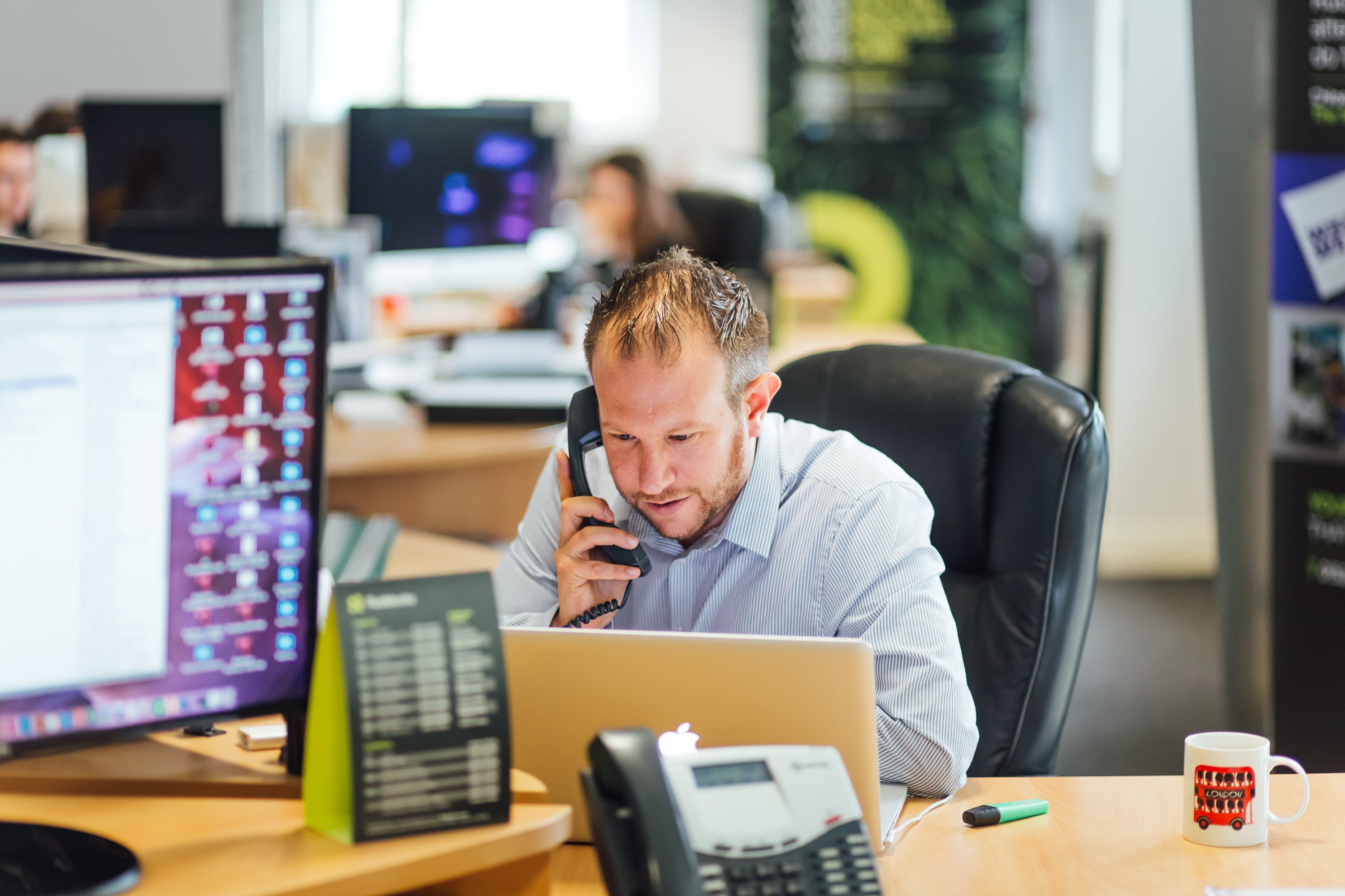 Ruddocks Employee on phone