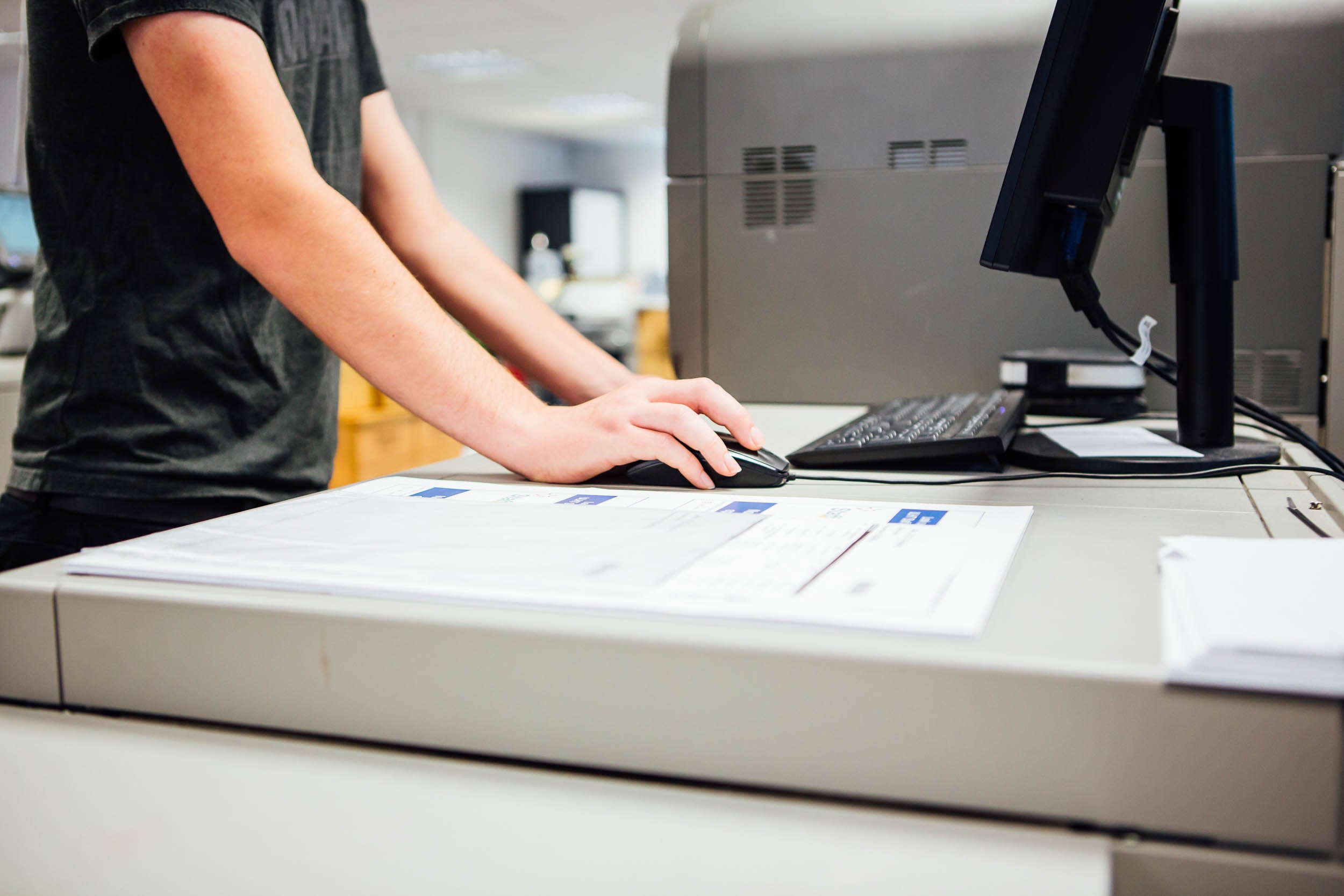 Ruddocks Digital Print Operator using computer