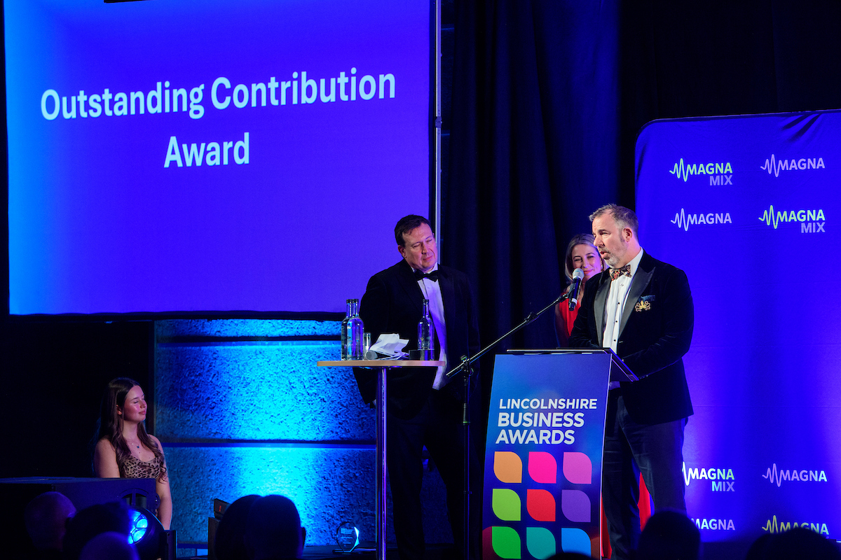 Paul Banton accepting the Outstanding Contribution Award 2026.