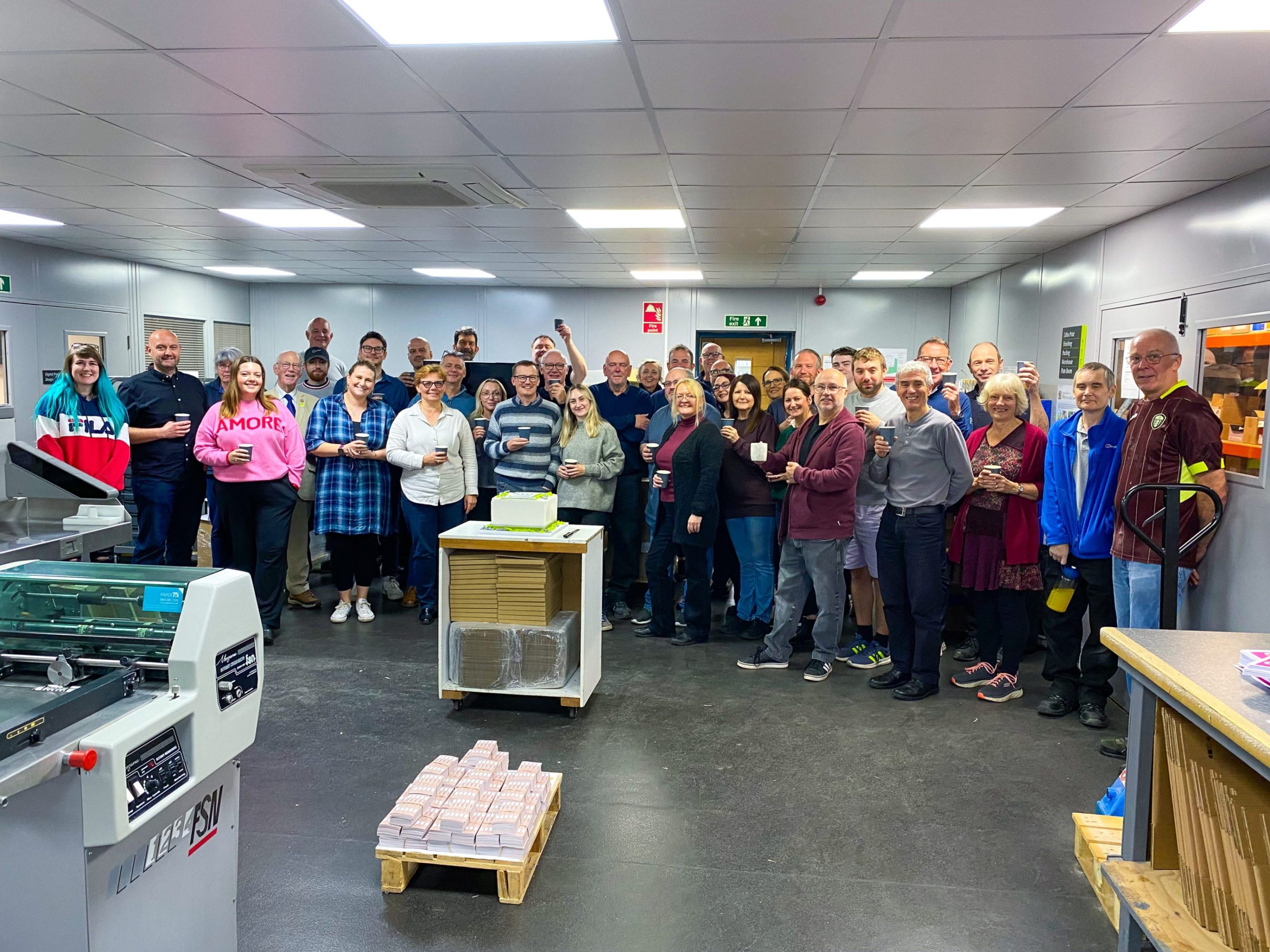 ruddocks team celebrating one year as a Certified B Corp